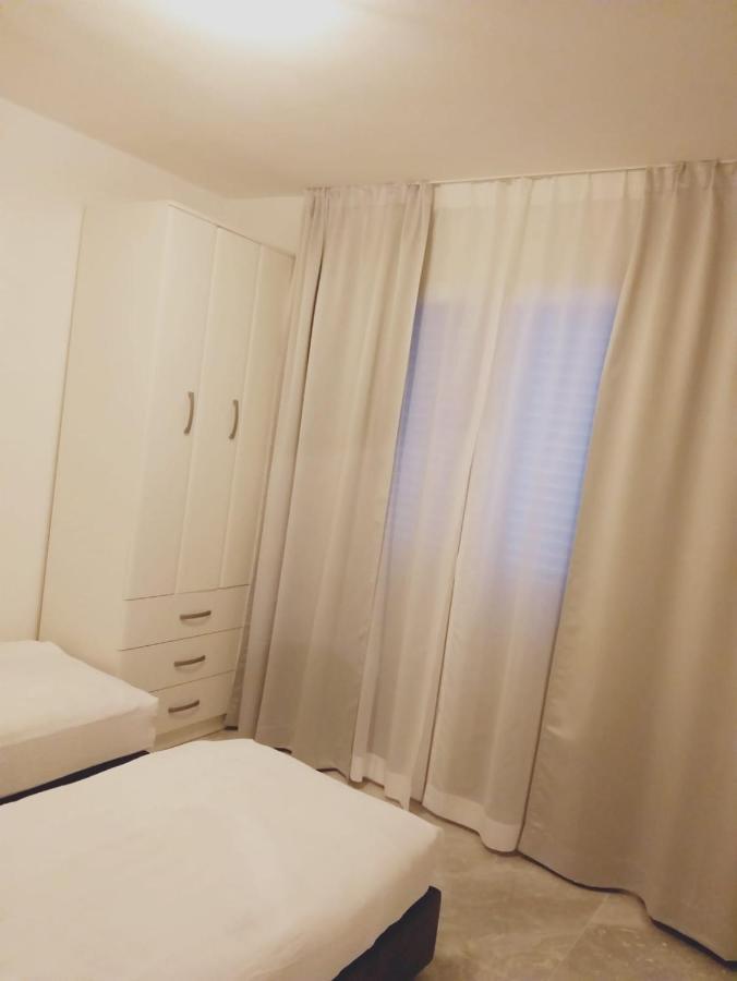 Sandy Apartment Nin Bagian luar foto